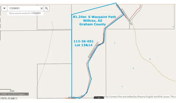 a picture of a bathroom with a shower