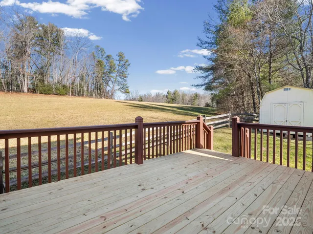 a balcony with wooden floor