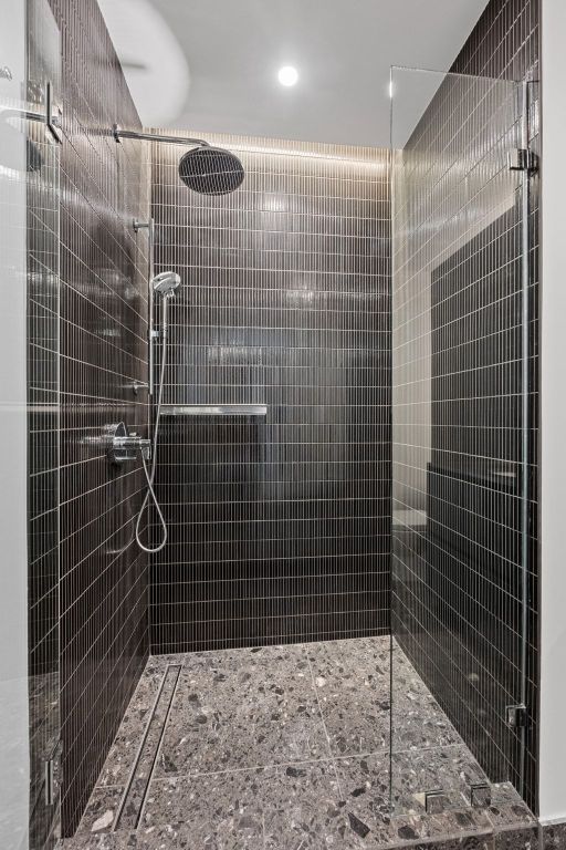 610 Davis Street, Unit 4308 Austin, TX 78701 - Photo 15 of 21 a bathroom with a shower