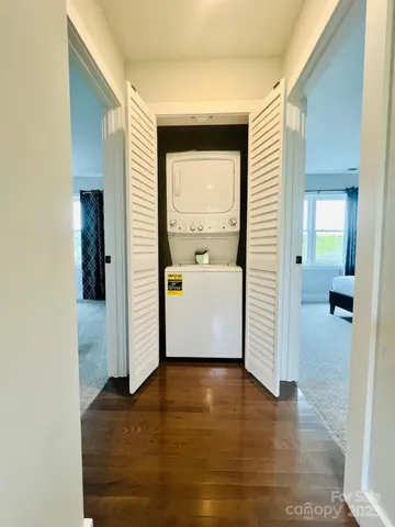 a outdoor sitting area with furniture and wooden floor