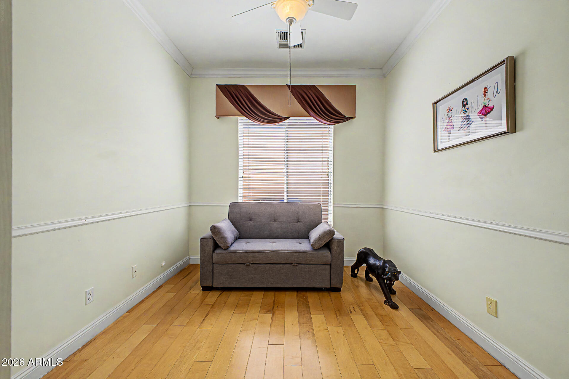 808 West Citrus Way Phoenix, AZ 85013 - Photo 20 of 35 a living room with furniture and a wooden floor