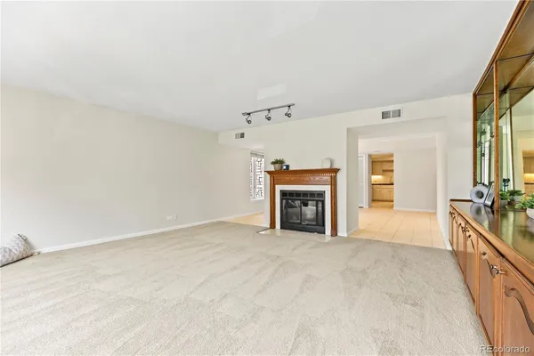 a kitchen that has a sink and cabinets