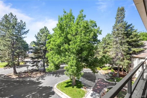 a bathroom with a tub double vanity sink and a mirror