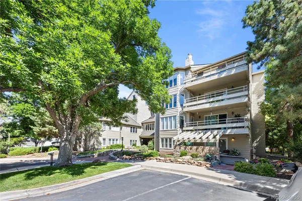 a front view of a building with street view