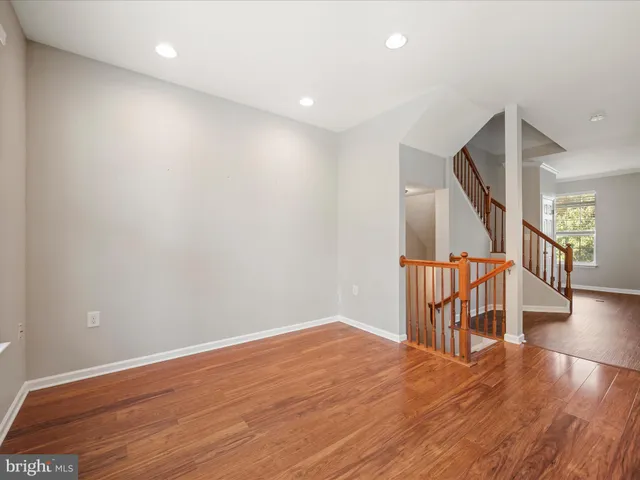 a view of entryway with wooden floor