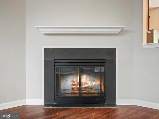 a living room with a fireplace