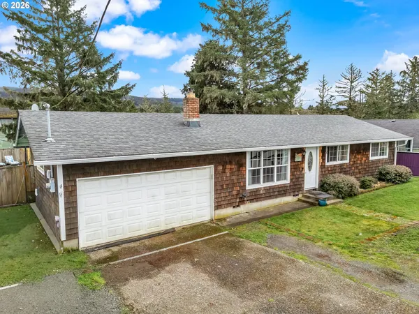 a backyard of a house with yard and outdoor seating