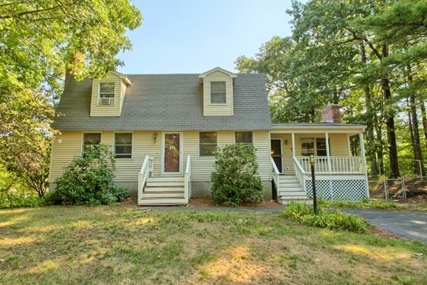 42 Emery Road Townsend, MA 01469 - Photo 1 of 30 a front view of a house with a garden
