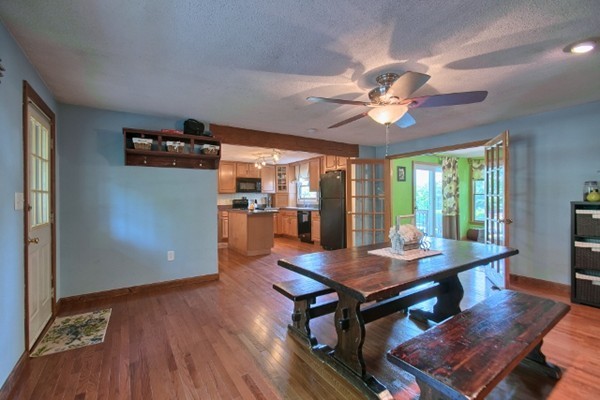 42 Emery Road Townsend, MA 01469 - Photo 6 of 30 a view of a dining room with furniture and wooden floor