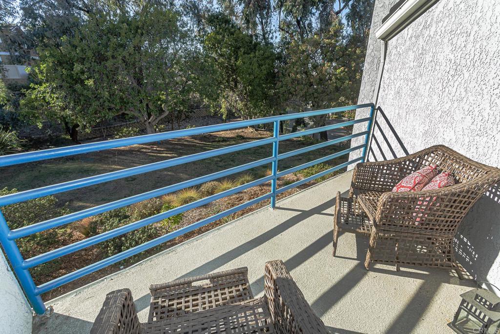 656 Westlake Street Encinitas, CA 92024 - Photo 35 of 41 a view of balcony with wooden floor and fence