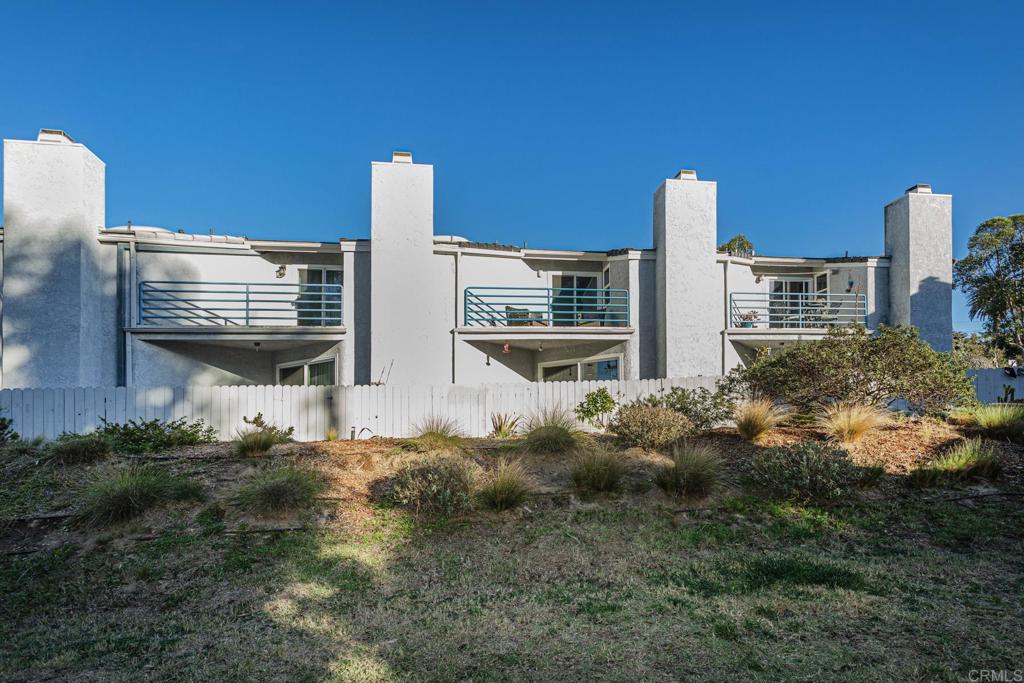 656 Westlake Street Encinitas, CA 92024 - Photo 8 of 41 a view of a house with a yard and plants