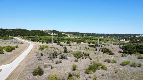 an aerial view of residential house and outdoor space