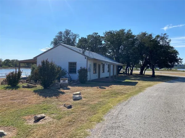 a view of a lake with a beach