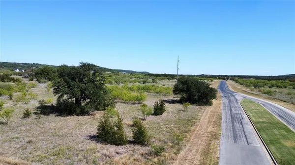 a view of a pathway with a lake view