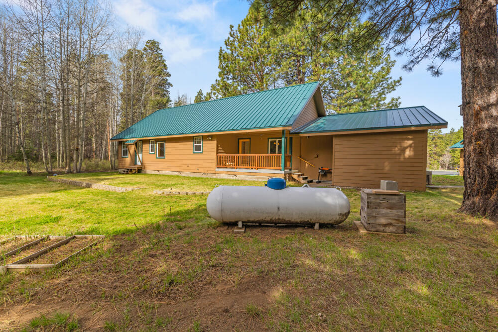 25437 Rocky Point Road Klamath Falls, OR 97601 - Photo 57 of 90 53 backyard with propane tank