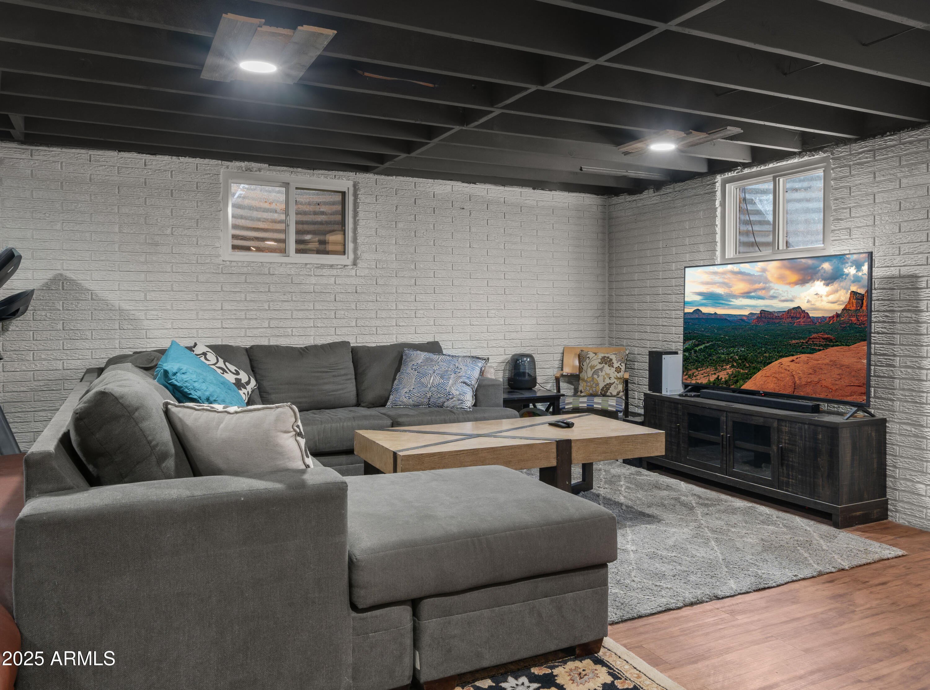 3501 East Coronado Road Phoenix, AZ 85008 - Photo 22 of 57 a living room with furniture and a flat screen tv