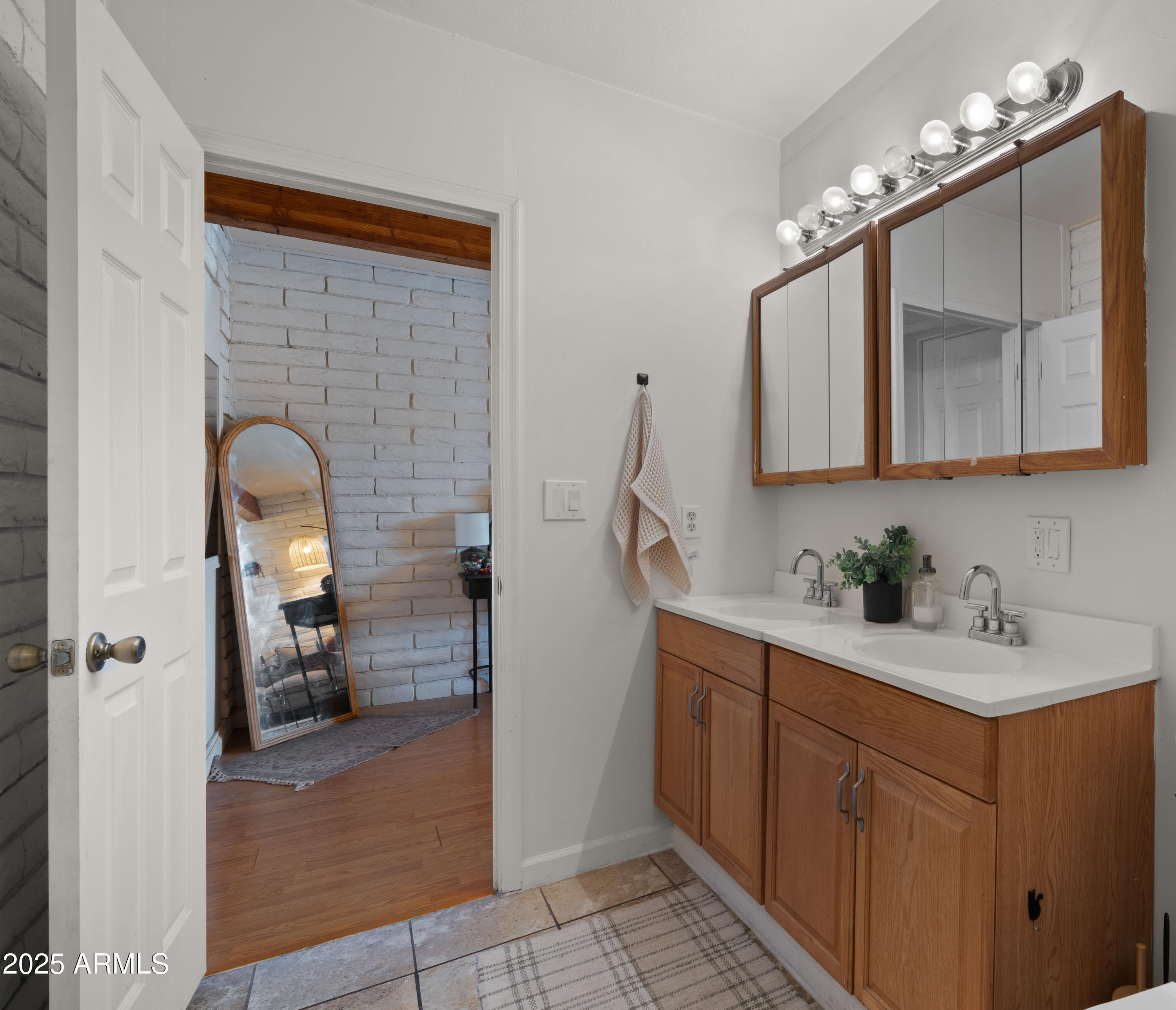 3501 East Coronado Road Phoenix, AZ 85008 - Photo 32 of 57 a bathroom with a sink and mirror
