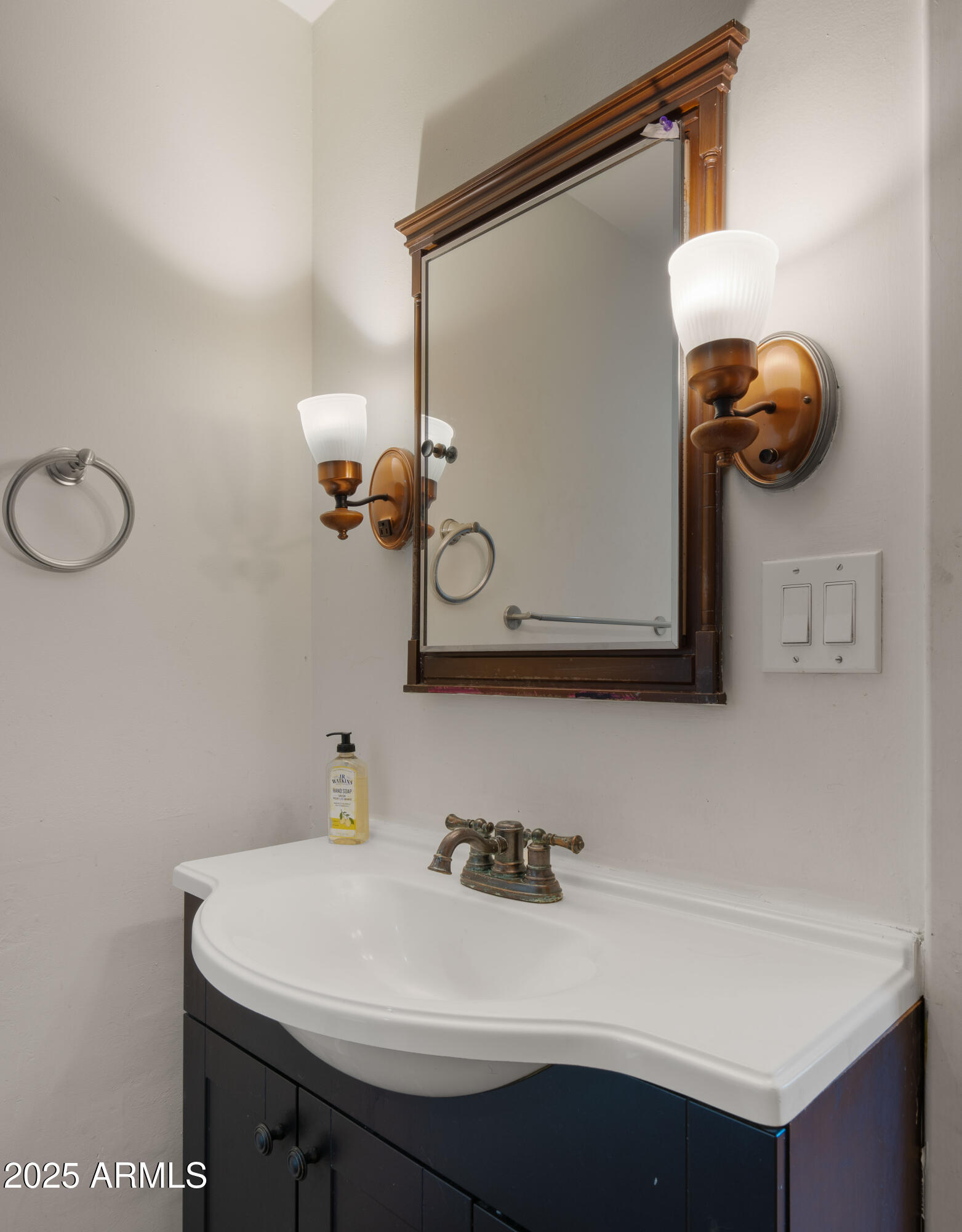 3501 East Coronado Road Phoenix, AZ 85008 - Photo 38 of 57 a bathroom with a sink and mirror