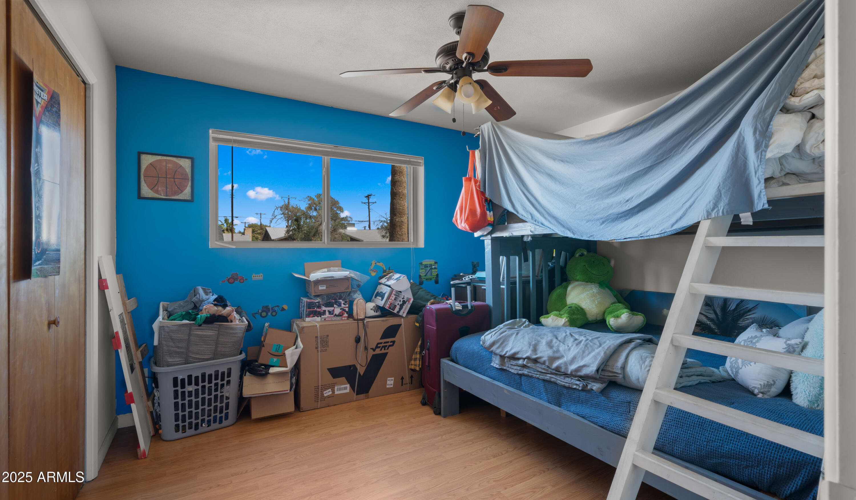 3501 East Coronado Road Phoenix, AZ 85008 - Photo 39 of 57 a bedroom with furniture and a lamp