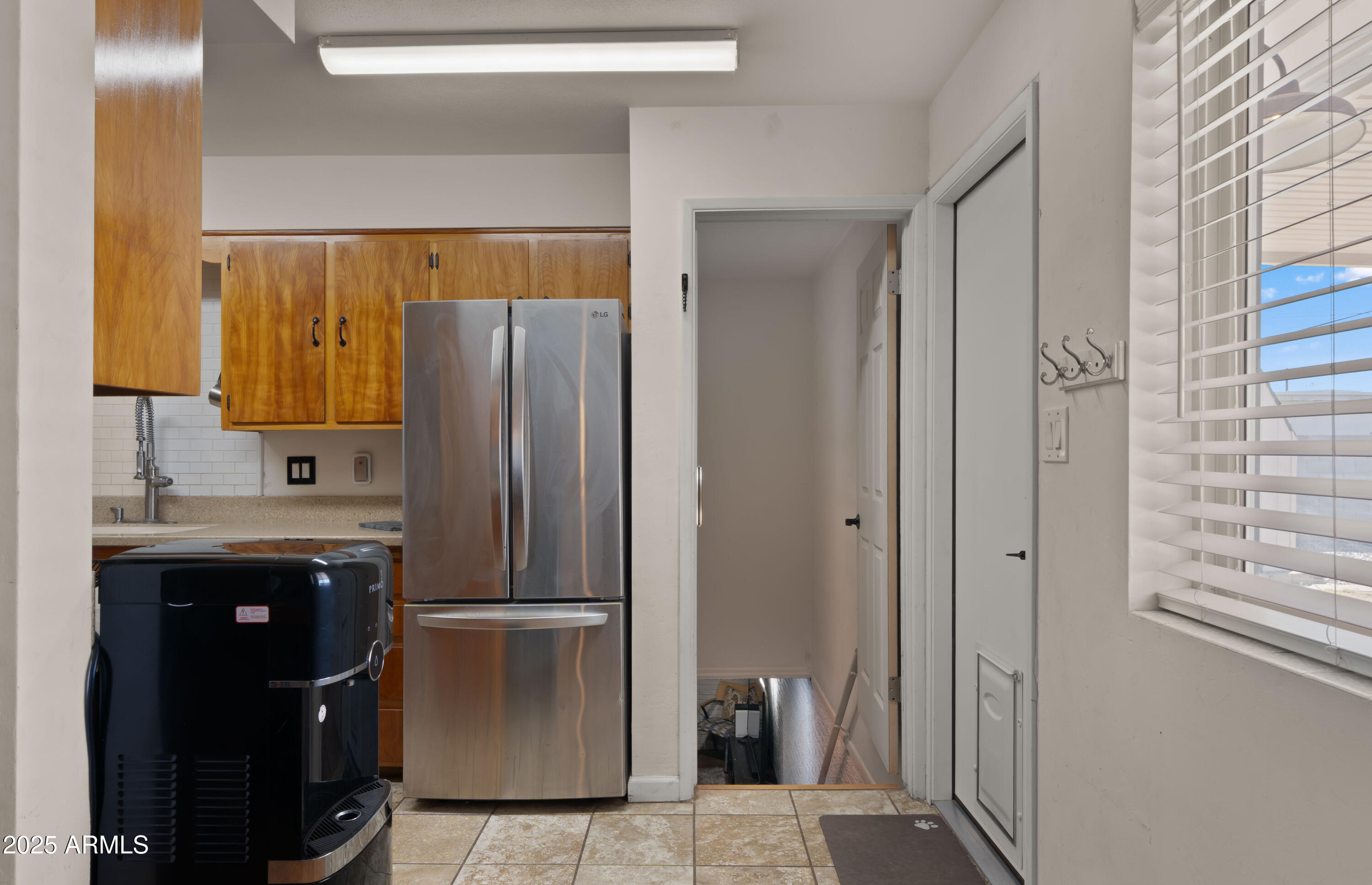 3501 East Coronado Road Phoenix, AZ 85008 - Photo 43 of 57 a kitchen with a refrigerator and a sink
