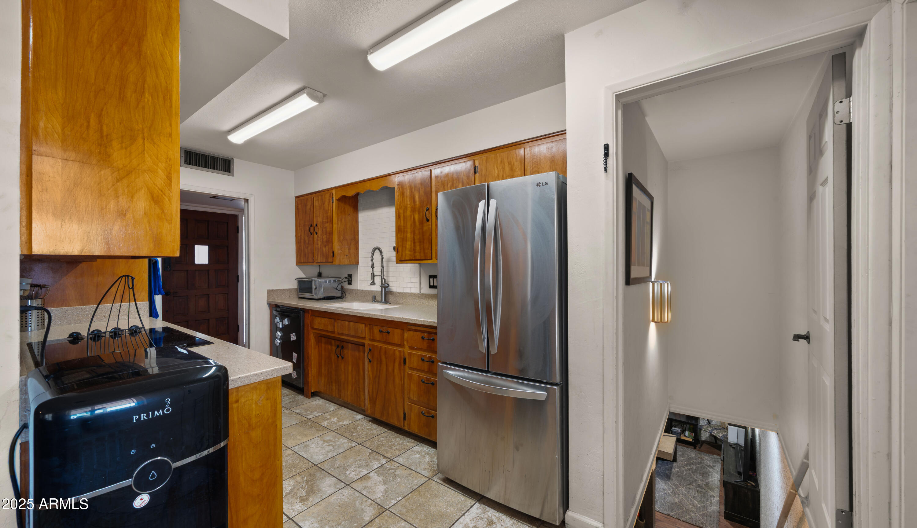 3501 East Coronado Road Phoenix, AZ 85008 - Photo 44 of 57 a kitchen with a refrigerator and a stove