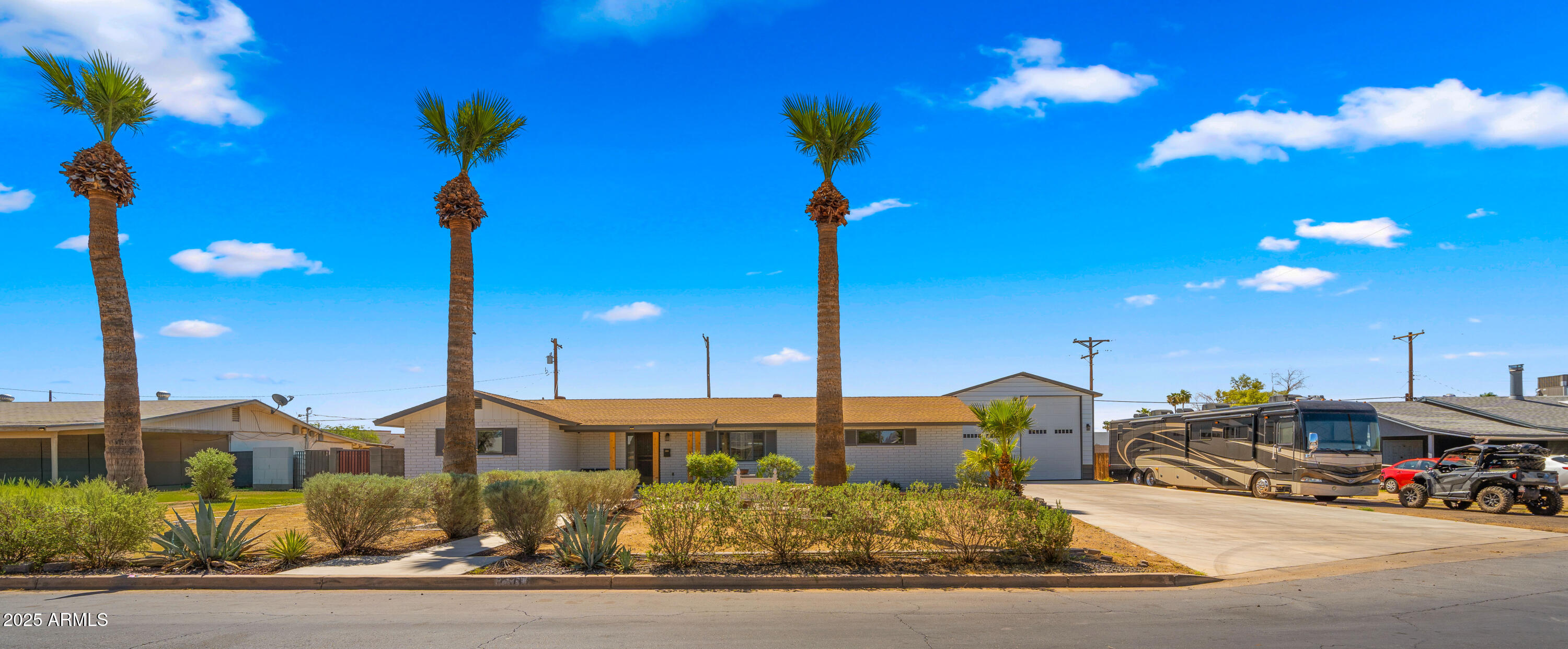 3501 East Coronado Road Phoenix, AZ 85008 - Photo 57 of 57 a front view of a house with a garden