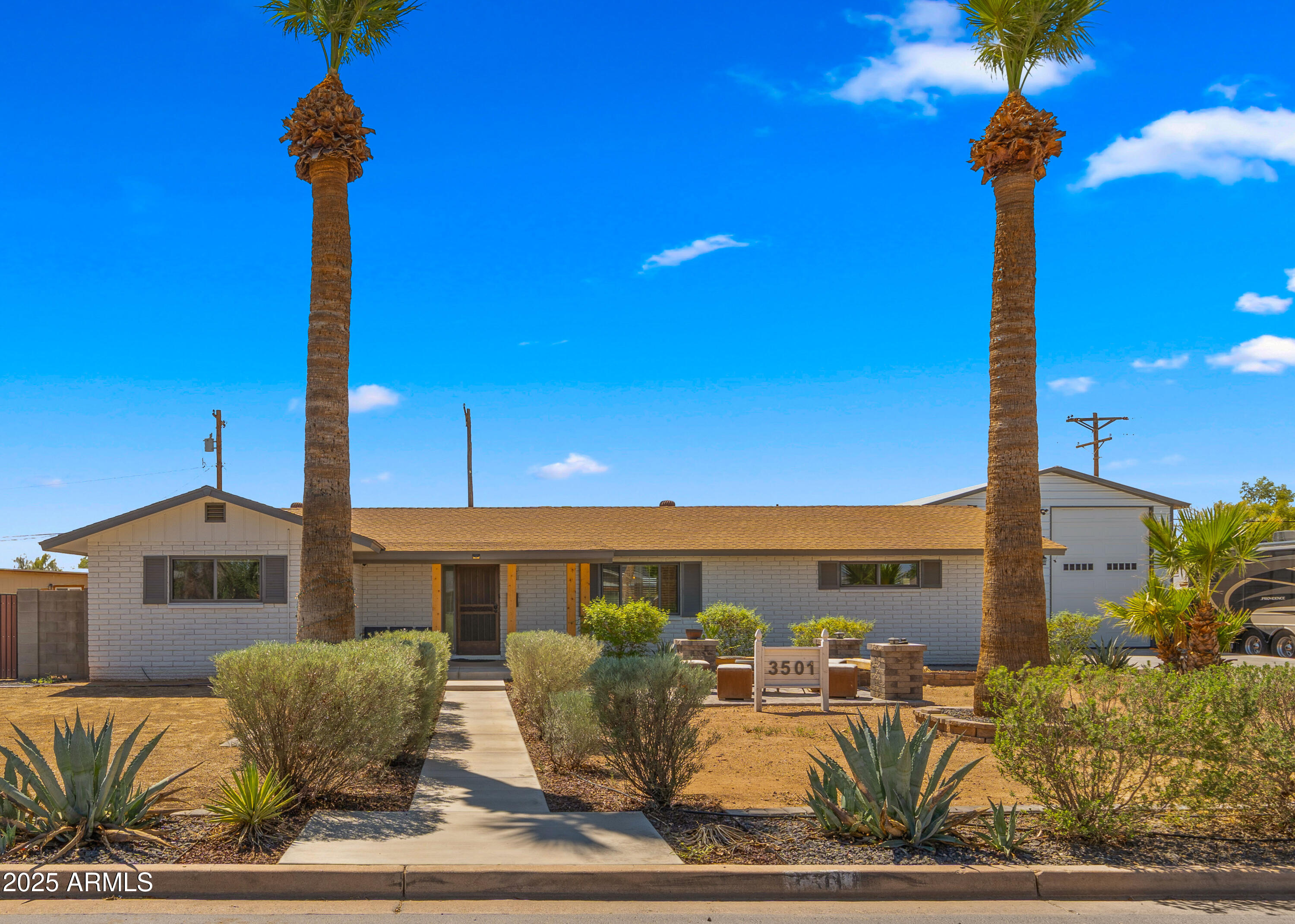3501 East Coronado Road Phoenix, AZ 85008 - Photo 9 of 57 a front view of a house with garden