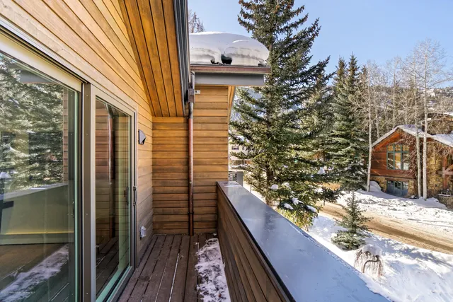 a balcony view with a outdoor seating