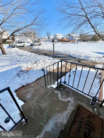 a view of a backyard of a house