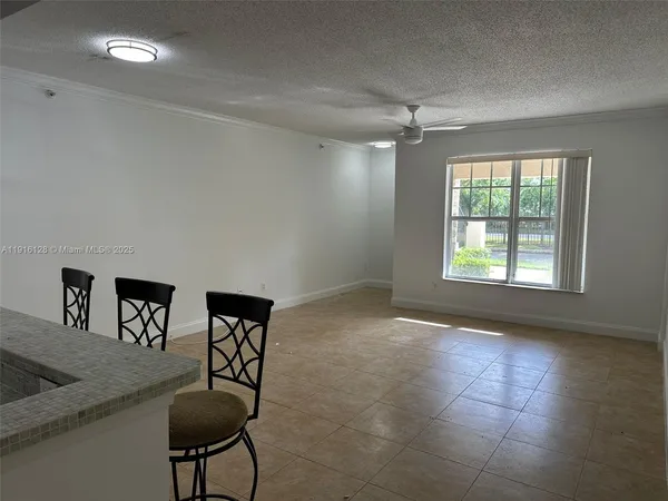 a view of livingroom with furniture wooden floor and window