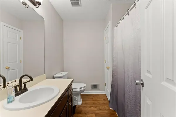 a bathroom with a sink and a toilet