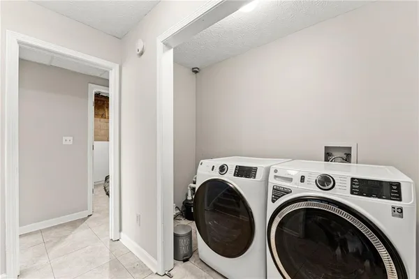a view of utility room with washer and dryer