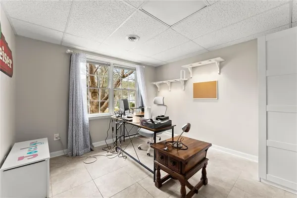 a living room with furniture and a window