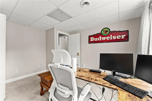 a view of a workspace with furniture