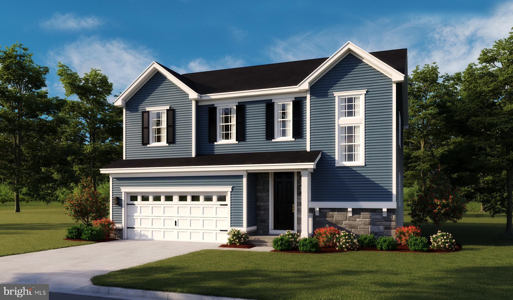 Bluestem Way, Unit BEDFORD Fredericksburg, VA 22407 - Photo 1 of 15 a front view of a house with a yard and garage