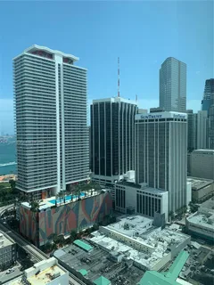 a view of a balcony with a potted plant