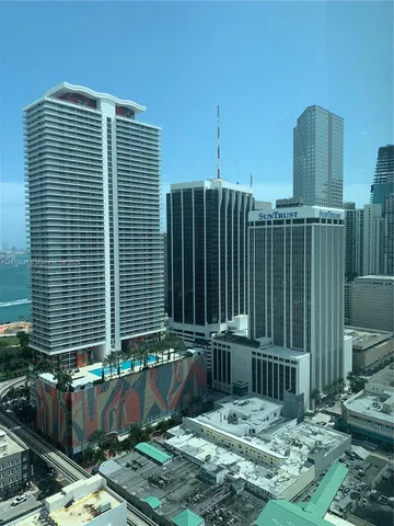 a view of a balcony with a potted plant