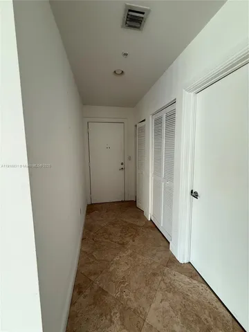 an empty room with a natural light