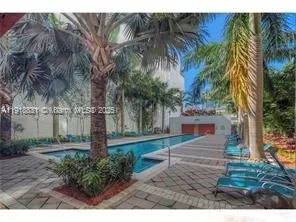 a view of a living room and dining room