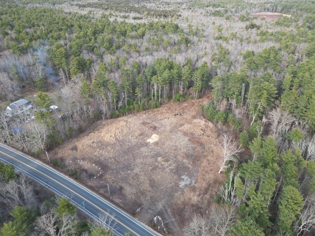 0 Palmer Road Plympton, MA 02367 - Photo 15 of 15 a view of a yard with plants and wooden fence