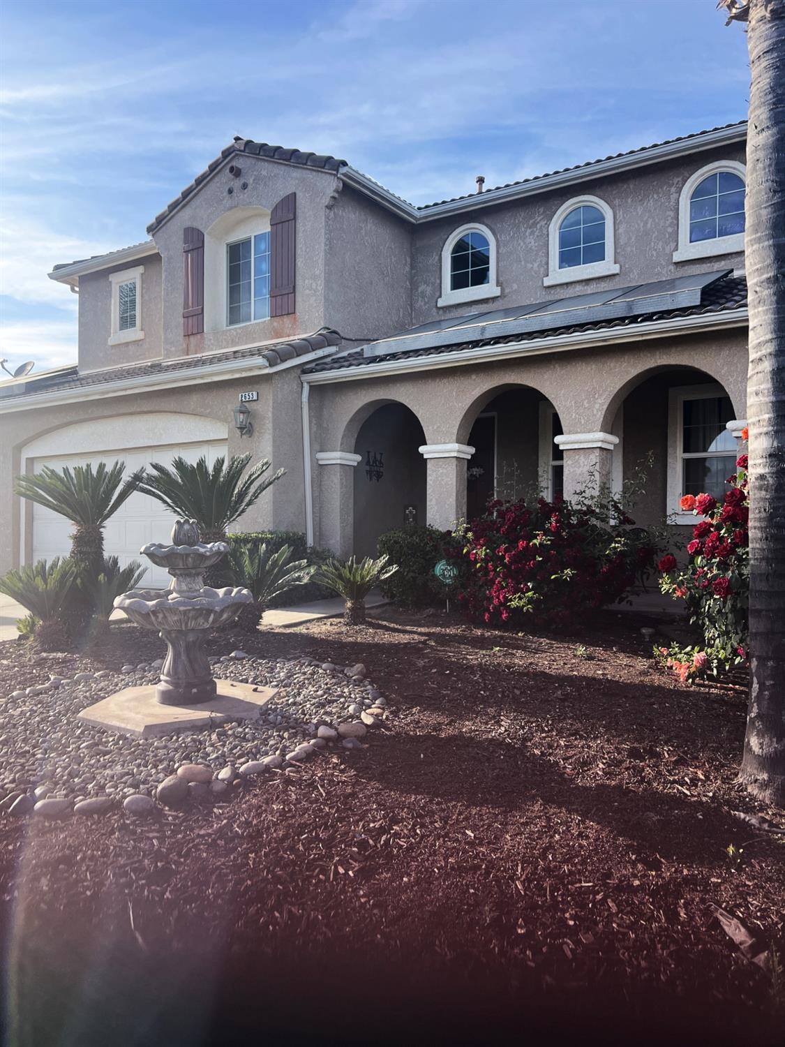 a front view of grey house