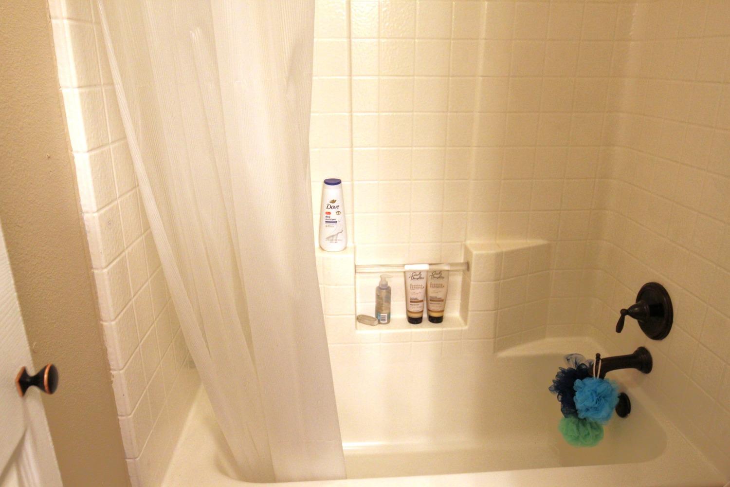 2653 Ashcroft Avenue Clovis, CA 93611 - Photo 20 of 45 a bathroom with a shower