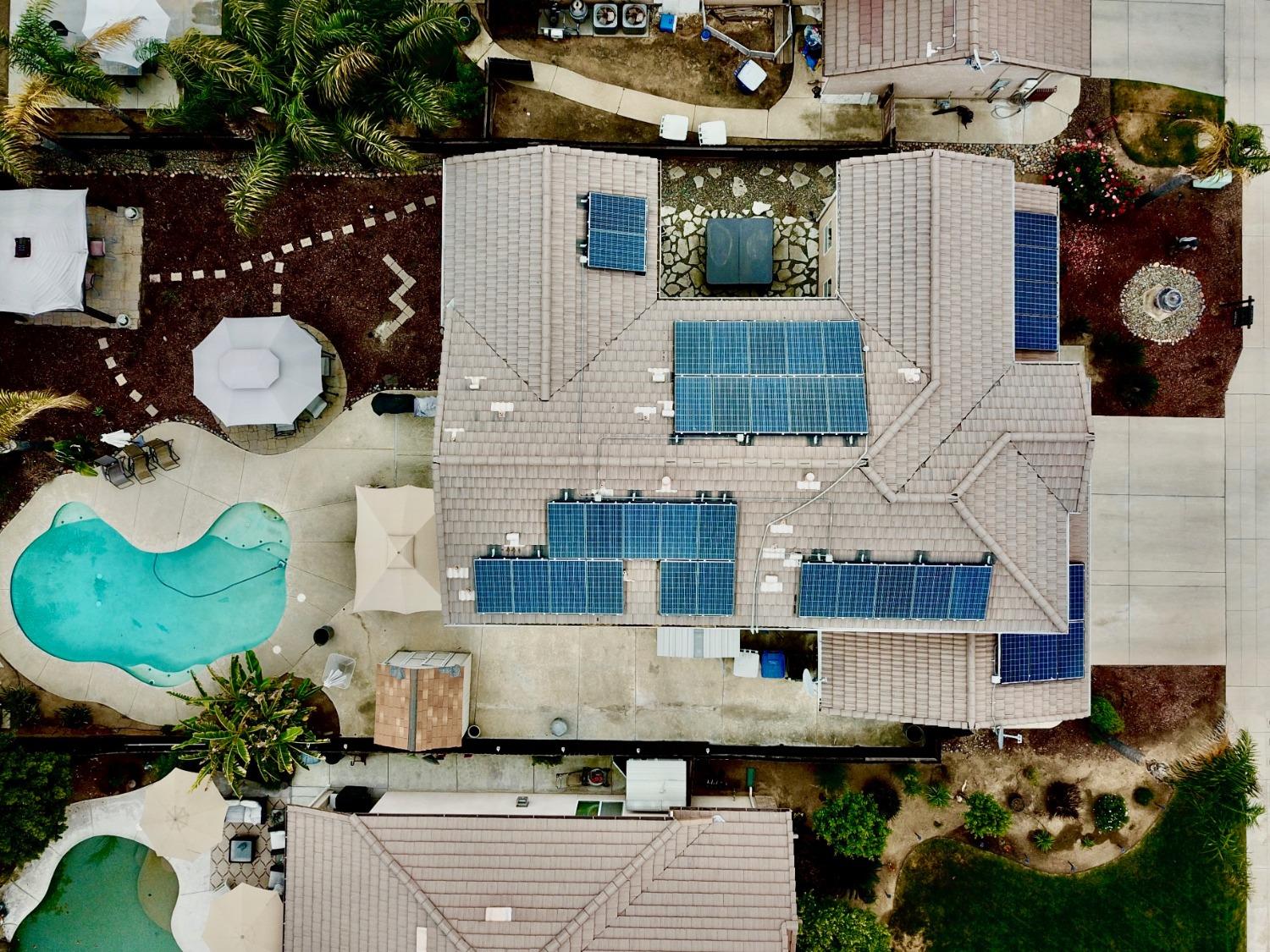2653 Ashcroft Avenue Clovis, CA 93611 - Photo 43 of 45 a kitchen with a sink and a stove