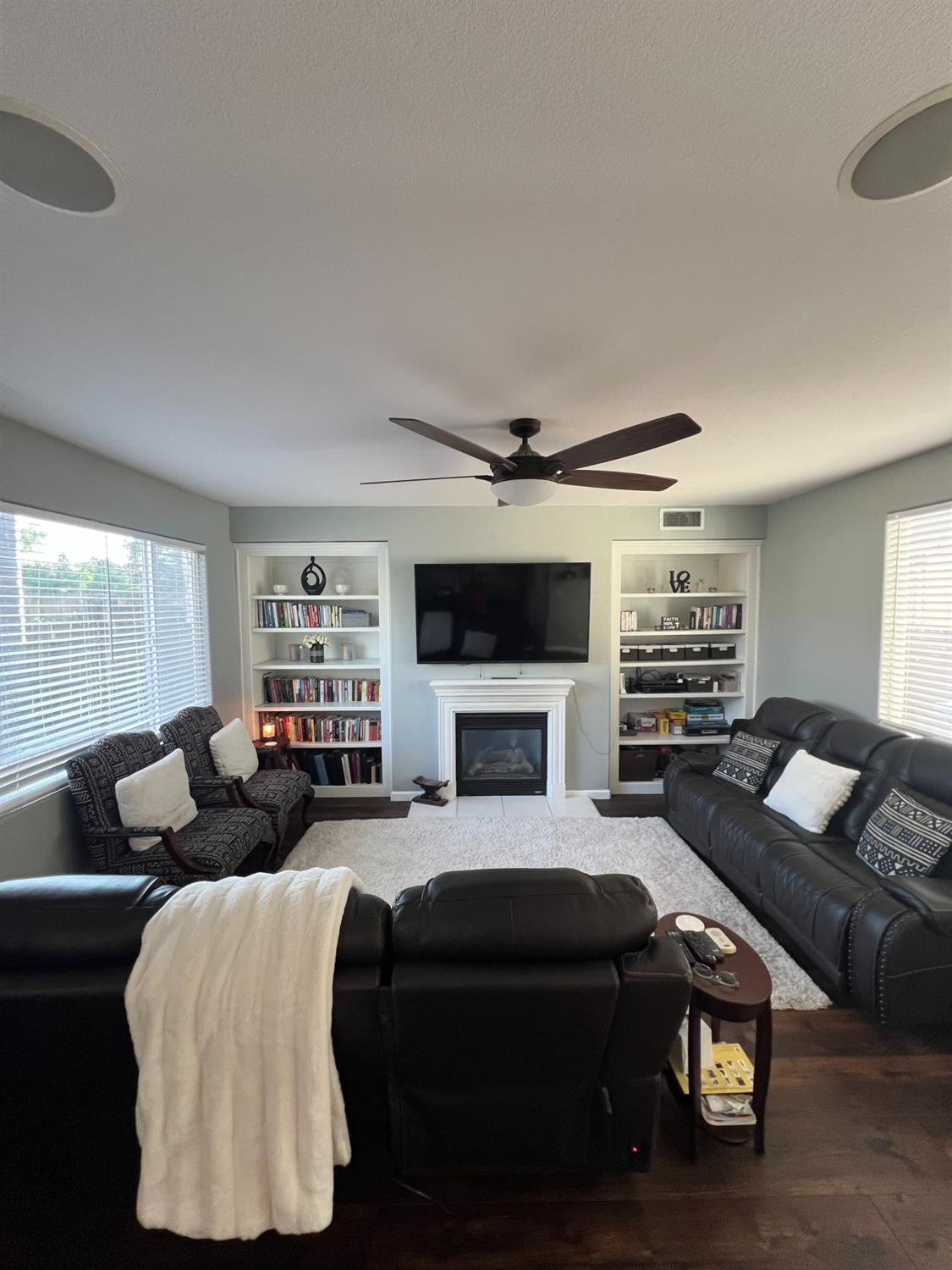 2653 Ashcroft Avenue Clovis, CA 93611 - Photo 6 of 45 a living room with furniture and a fireplace