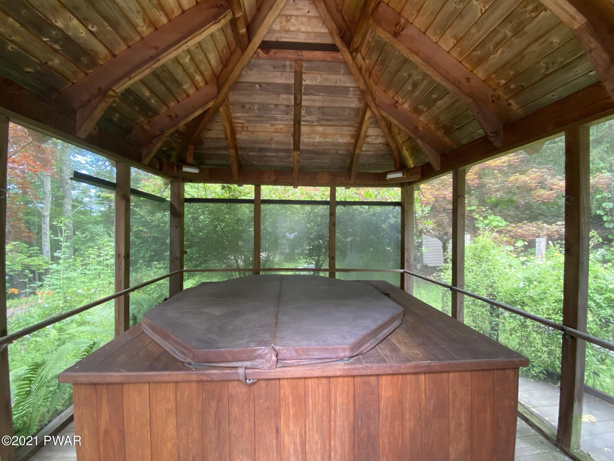 82 Paupack Point Road Hawley, PA 18428 - Photo 17 of 114 screened in gazebo and hot tub