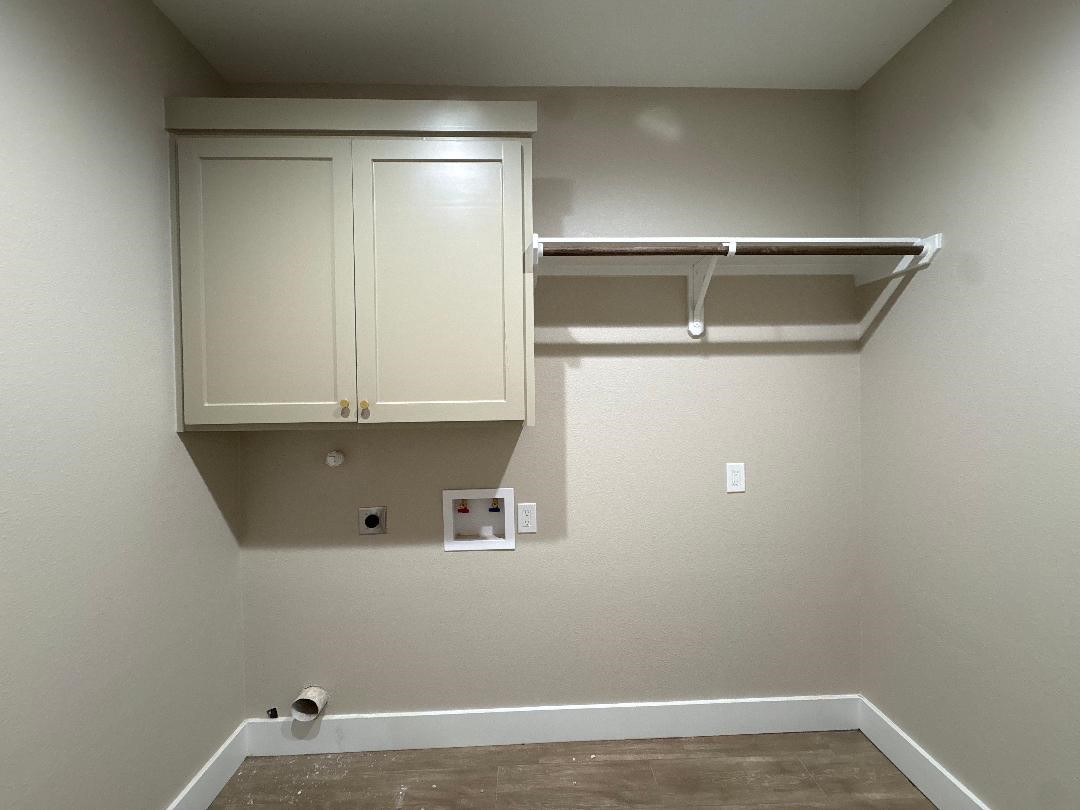 5680 Essie Lane Beaumont, TX 77713 - Photo 12 of 22 a view of storage and utility room with wooden floor