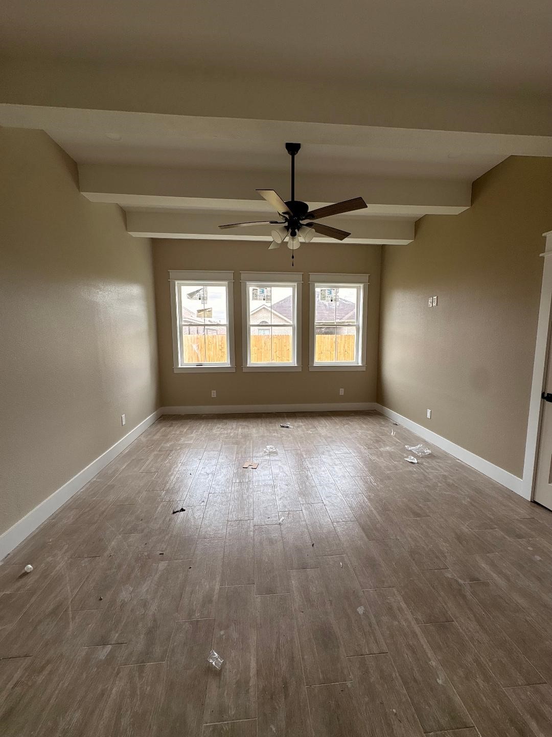 5680 Essie Lane Beaumont, TX 77713 - Photo 15 of 22 wooden floor in an empty room with a window