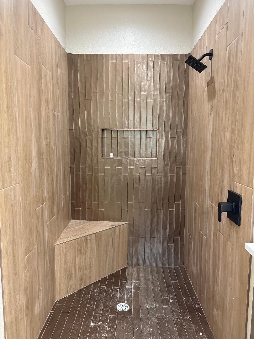 5680 Essie Lane Beaumont, TX 77713 - Photo 18 of 22 a bathroom with a shower and a tub