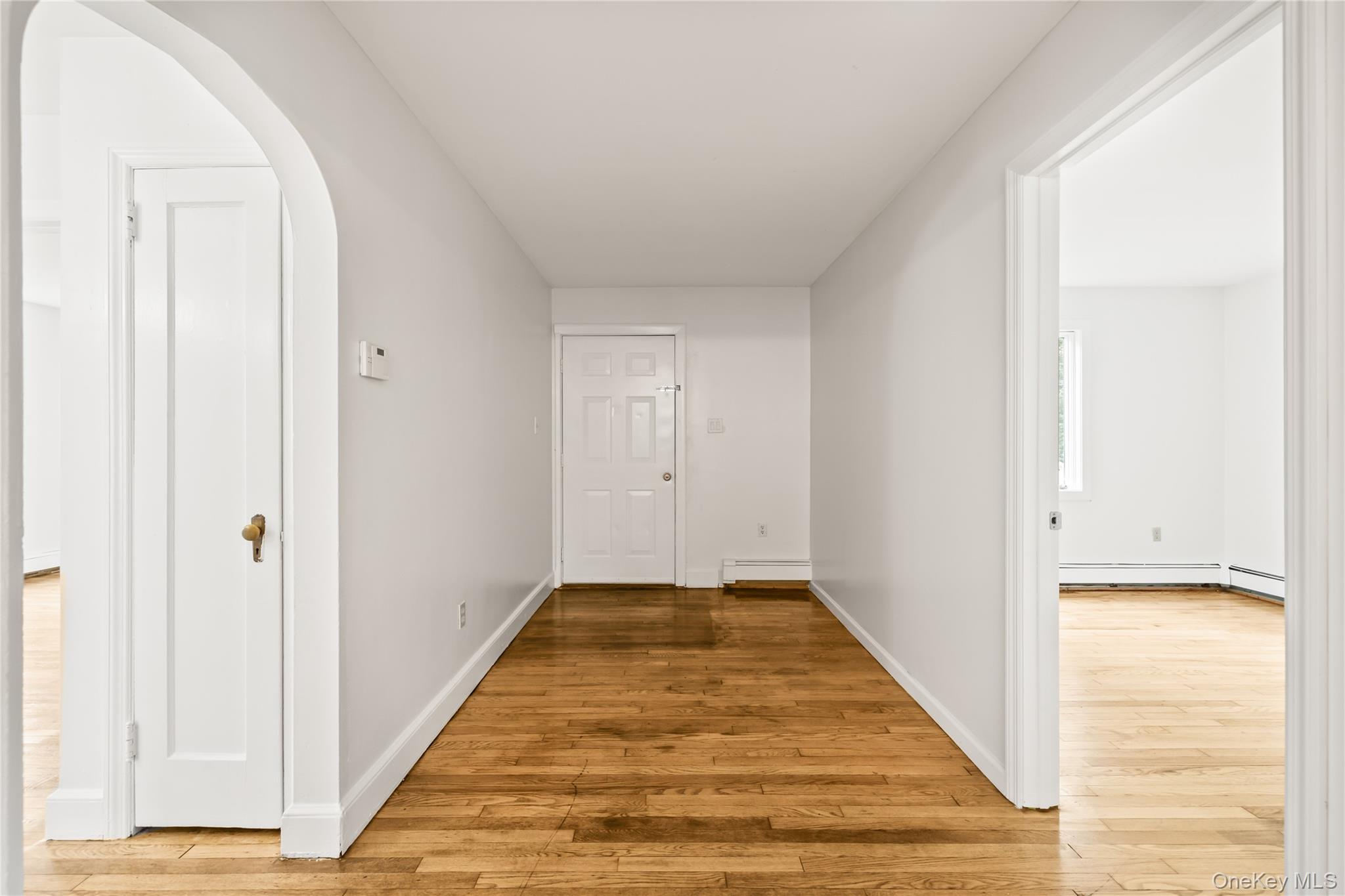 281-283 Old Haverstraw Road Congers, NY 10920 - Photo 5 of 41 a view of a hallway with wooden floor