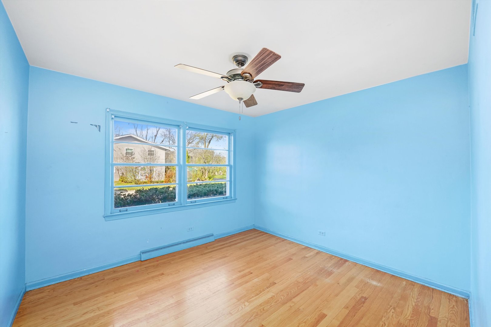 1725 North Happ Road Northbrook, IL 60062 - Photo 12 of 33 a view of an empty room with a window